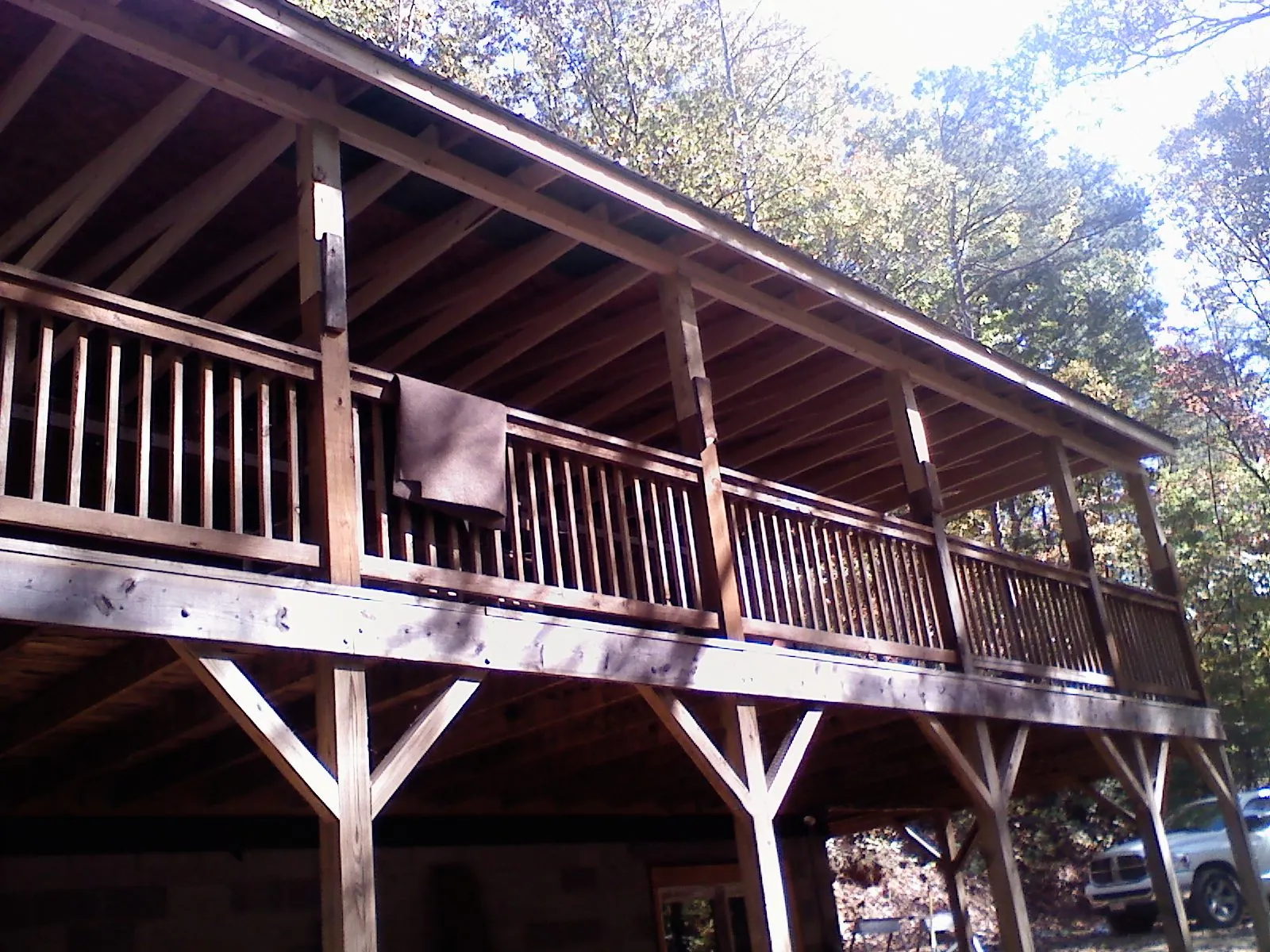 Timber framing under a new elevated porch and deck — Roof Leak Repair in Hennepin by Roofing Brothers